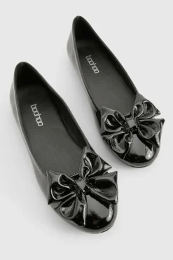 Ballerine en cuir verni à nœud et bout rond