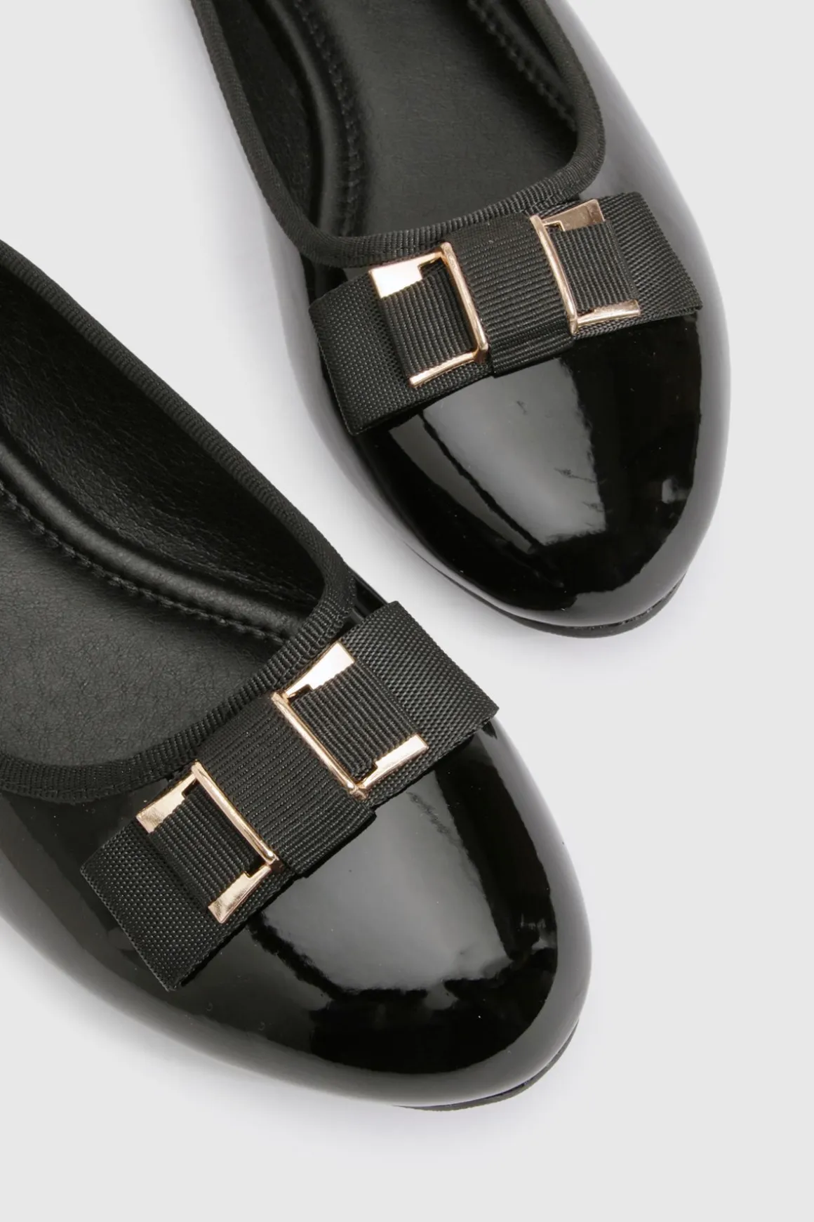 Ballerines à détail de nœud doré