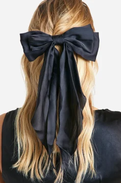 Barrette à cheveux large en satin avec nœud noir