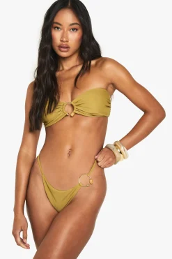 Bas de bikini tanga avec garniture en pierre résineuse et détail d'anneau doré