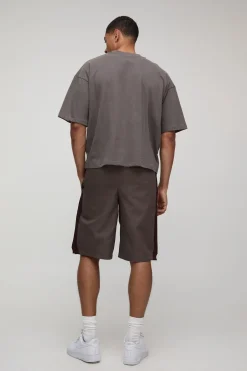 Bermudas à taille élastiquée, coupe décontractée, longueur longue et broderie