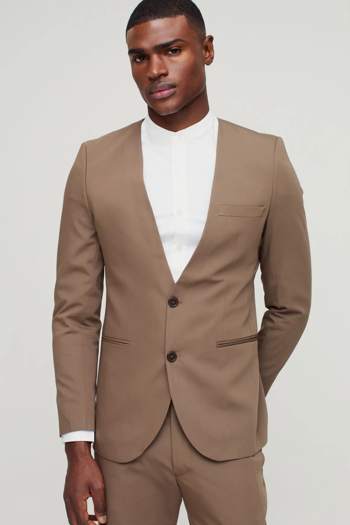 Blazer ajusté sans col à simple boutonnage