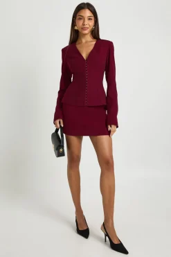 Blazer cintré à manches baril et taille ceinturée