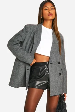 Blazer oversize à double boutonnage en chevron avec ourlet effiloché