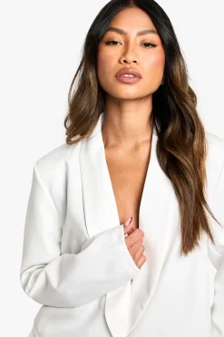 Blazer oversize à épaules rembourrées et décolleté plongeant