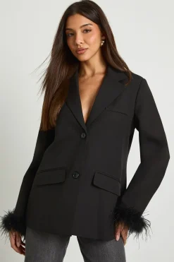 Blazer oversize à poignets en plumes