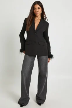 Blazer oversize à poignets en plumes