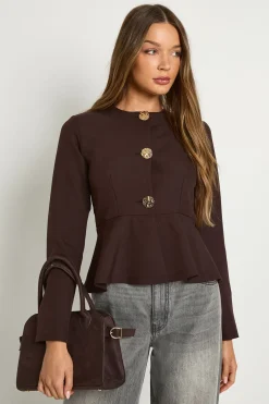 Blazer peplum à boutons dorés