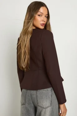 Blazer peplum à boutons dorés