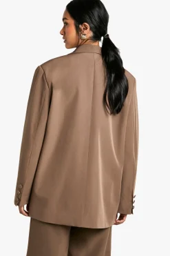 Blazer surdimensionné à détails de poches tissées sur mesure