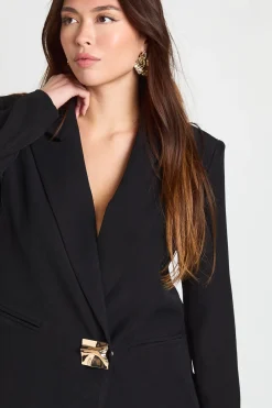 Blazer surdimensionné à la coupe ajustée avec garniture dorée