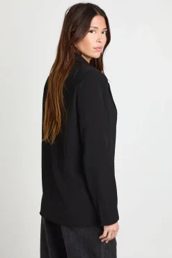 Blazer surdimensionné à la coupe ajustée avec garniture dorée