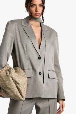 Blazer tissé ajusté avec nœud décoratif