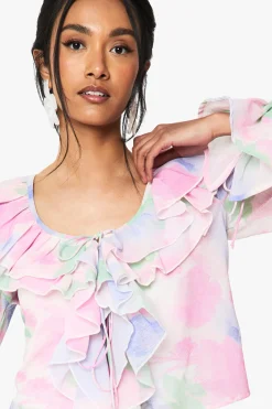 Blouse en chiffon à motifs floraux et volants