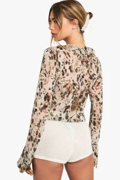 Blouse en chiffon à nouer avec volant sur le devant
