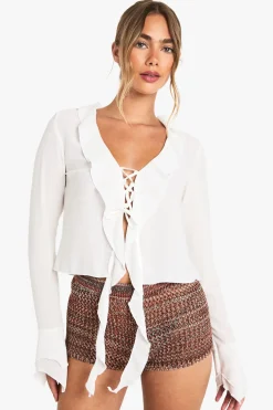 Blouse en chiffon à nouer sur le devant et à volants