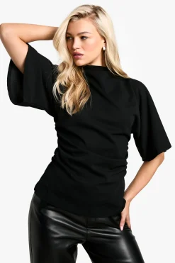 Blouse en crêpe jersey à col haut et manches évasées