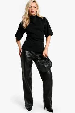 Blouse en crêpe jersey à col haut et manches évasées