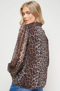 Blouse en Mousseline à Col Noué et Détails Volantés Imprimée