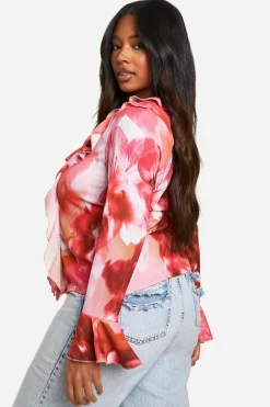 Blouse florale à volants sur le devant grande taille