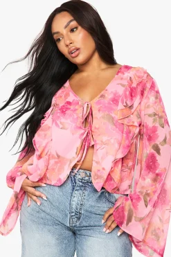 BLOUSE À VOLANTS ET LAÇAGE FRONTAL