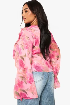 BLOUSE À VOLANTS ET LAÇAGE FRONTAL
