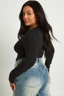 Body grande taille à manches longues, décolleté en cuillère
