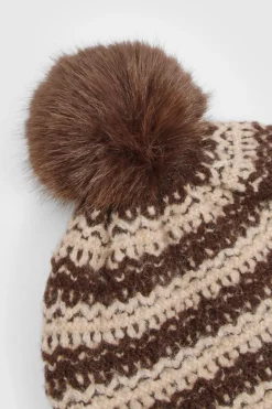 Bonnet tricoté à pompon rayé