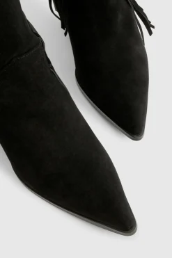 boohoo Botte chevillère western à talon, coupe large, en fausse suède avec détails frangés et pompons< Bottes Mi-Hautes|Bottes