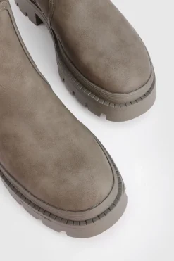 Botte à genou à coupe large et à semelle cramponnée