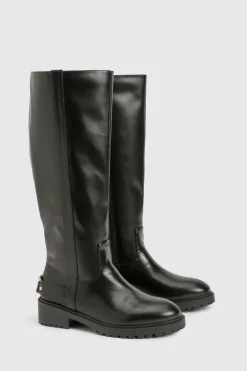 Bottes de biker montantes aux détails métalliques