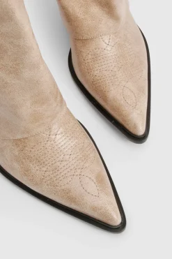 Bottes de cowboy western à talons usées