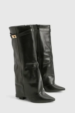 Bottes hautes jusqu'au genou avec détail de boucle et talon bloc repliable.