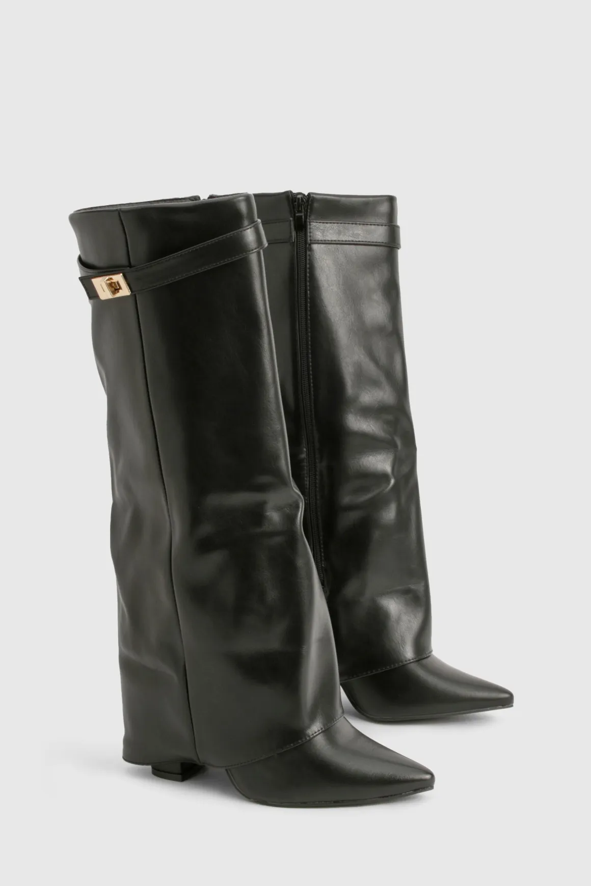 Bottes hautes jusqu'au genou avec détail de boucle et talon bloc repliable.