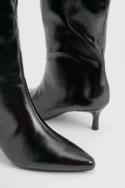 Bottes hautes jusqu'aux genoux à bout pointu et à talon bas en synthétique