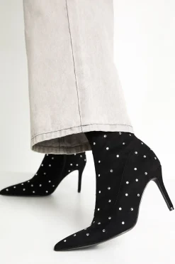 Bottes à la cheville en synthétique cloutées à bout pointu
