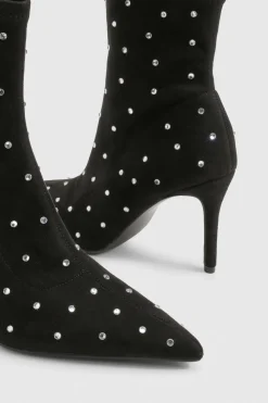 Bottes à la cheville en synthétique cloutées à bout pointu
