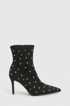 Bottes à la cheville en synthétique cloutées à bout pointu