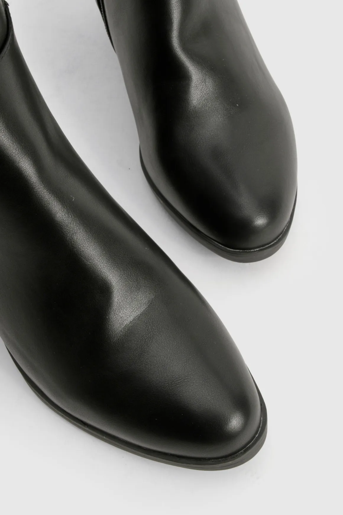 Bottes mi-hautes à panneau élastique détail coupe large