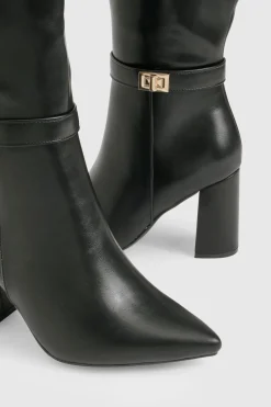 Bottes montantes à coupe large avec détails de verrouillage et talon bloc