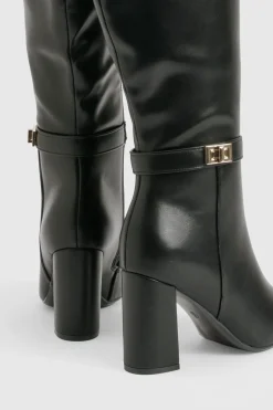 Bottes montantes à coupe large avec détails de verrouillage et talon bloc