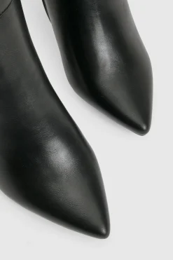 Bottes montantes à coupe large avec détails de verrouillage et talon bloc