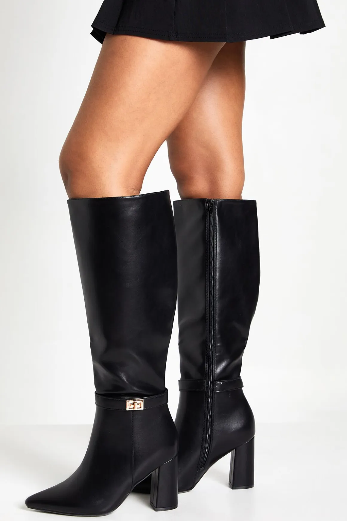 Bottes montantes à coupe large avec détails de verrouillage et talon bloc