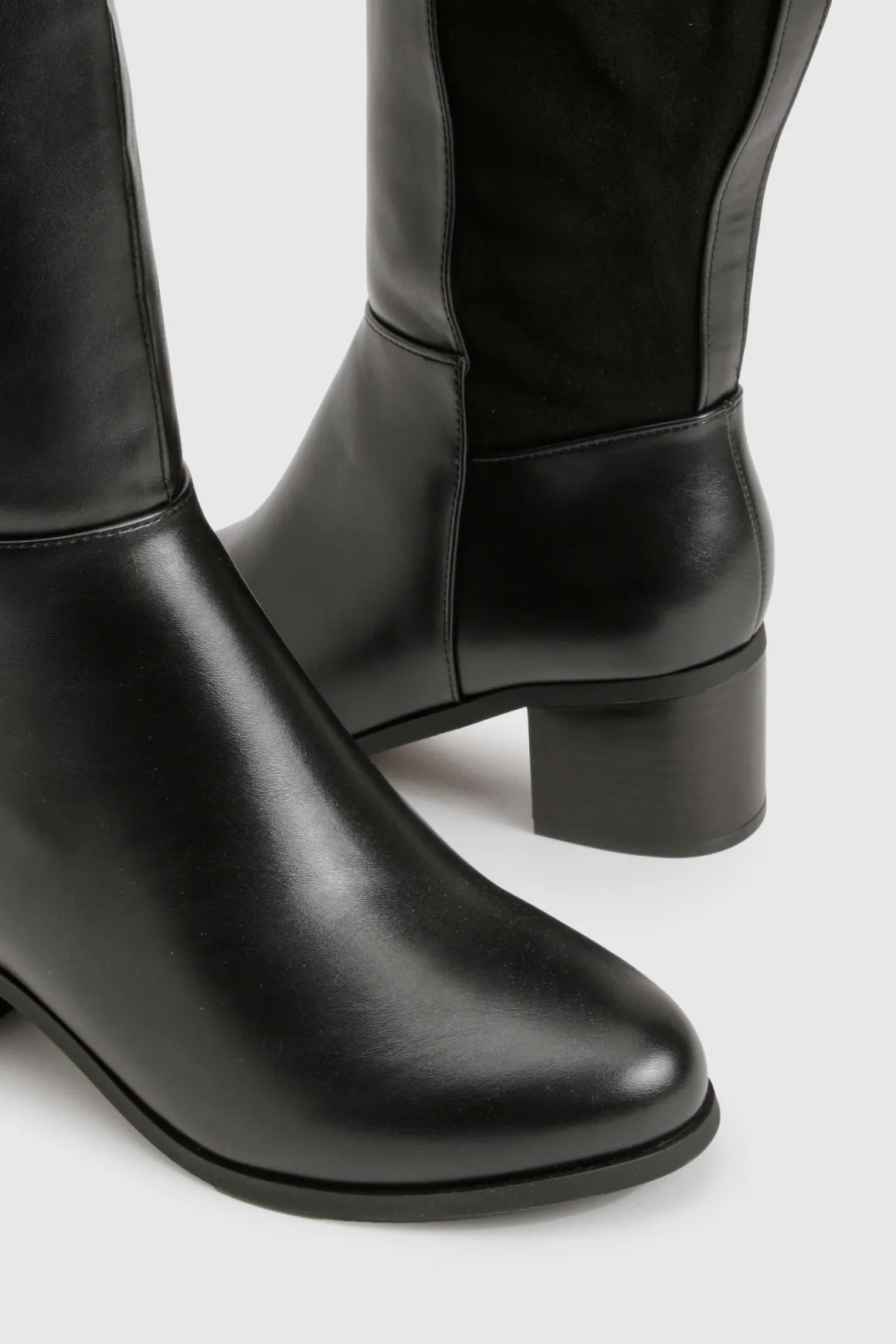 Bottes montantes à coupe large avec panneaux extensibles