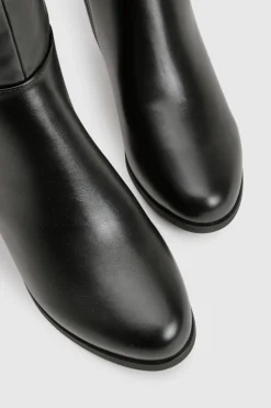 Bottes montantes à coupe large avec panneaux extensibles