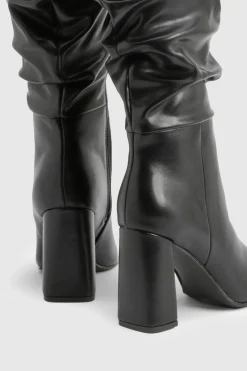 Bottes montantes froncées à talon bloc