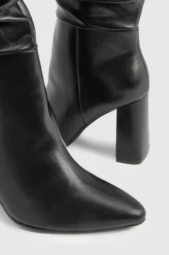 Bottes montantes froncées à talon bloc