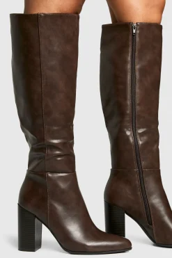 Bottes montantes jusqu'au genou à talon empilé