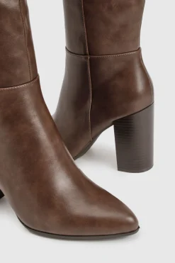 Bottes montantes jusqu'au genou à talon empilé