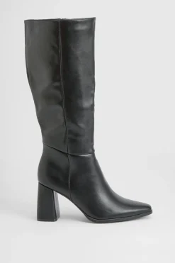 Bottes montantes jusqu'aux genoux à talon bloc et détail de couture